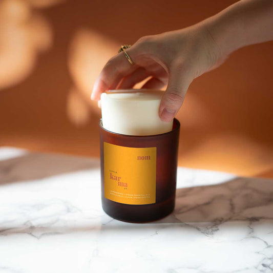 Nom uplifting candle for indulgence