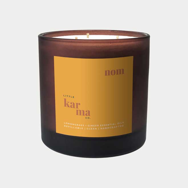 Nom uplifting candle for indulgence