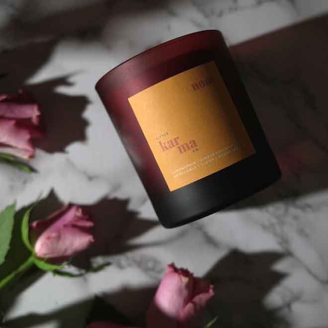Nom uplifting candle for indulgence