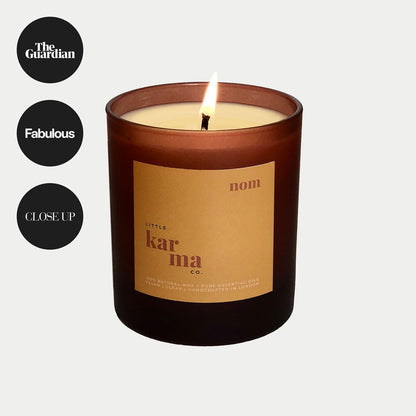 Nom uplifting candle for indulgence