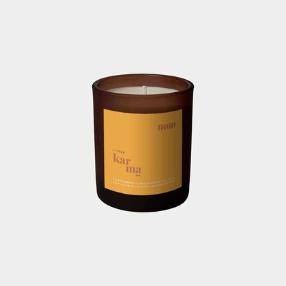 Nom uplifting candle for indulgence