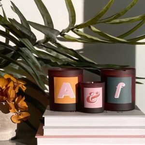 personalised refillable initial candles as seen in Architectural Digest, Good Homes and Home Style
