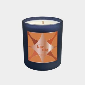 Sugar & Spice spiced chai latte refillable Christmas candle in a navy glass finished with a luxurious rose gold foil label