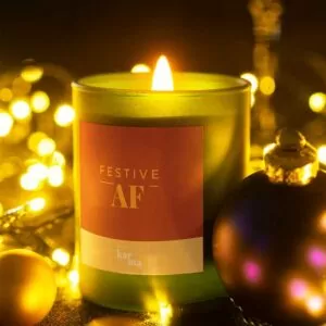 Refillable Festive AF cinnamon scented candle in green