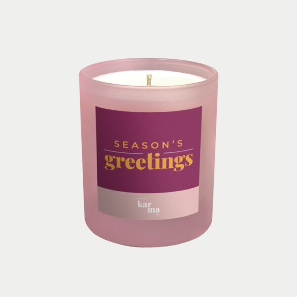 Refillable Season's Greetings scented candle in pink